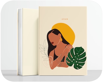 Könnte beinhalten: Ein gebundenes Buch mit cremefarbenem Einband, das eine grafische Illustration einer Person mit langem dunklem Haar, einer gelben Kreisform hinter dem Kopf und grünen Monstera-Blättern zeigt. Der Text GVAN ist in Orange gedruckt.