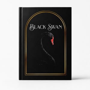 May include: A black hardcover book featuring a gold arched frame on the front cover. Inside the frame, the text "BLACK SWAN" is printed in white above a detailed illustration of a black swan with a bright red beak, set against a dark background.