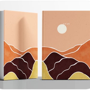 May include: A book cover with a minimalist design featuring a landscape of hills in shades of orange, brown, and yellow. The text "GYAN" is printed in white at the top of the cover.
