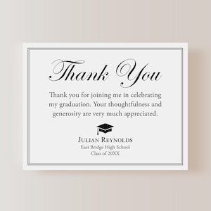 May include: A white thank you card with black text and a graduation cap icon. The text reads "Thank You" and "Thank you for joining me in celebrating my graduation. Your thoughtfulness and generosity are very much appreciated."  The card also includes the name "JULIAN REYNOLDS", "East Bridge High School", and "Class of 20XX".