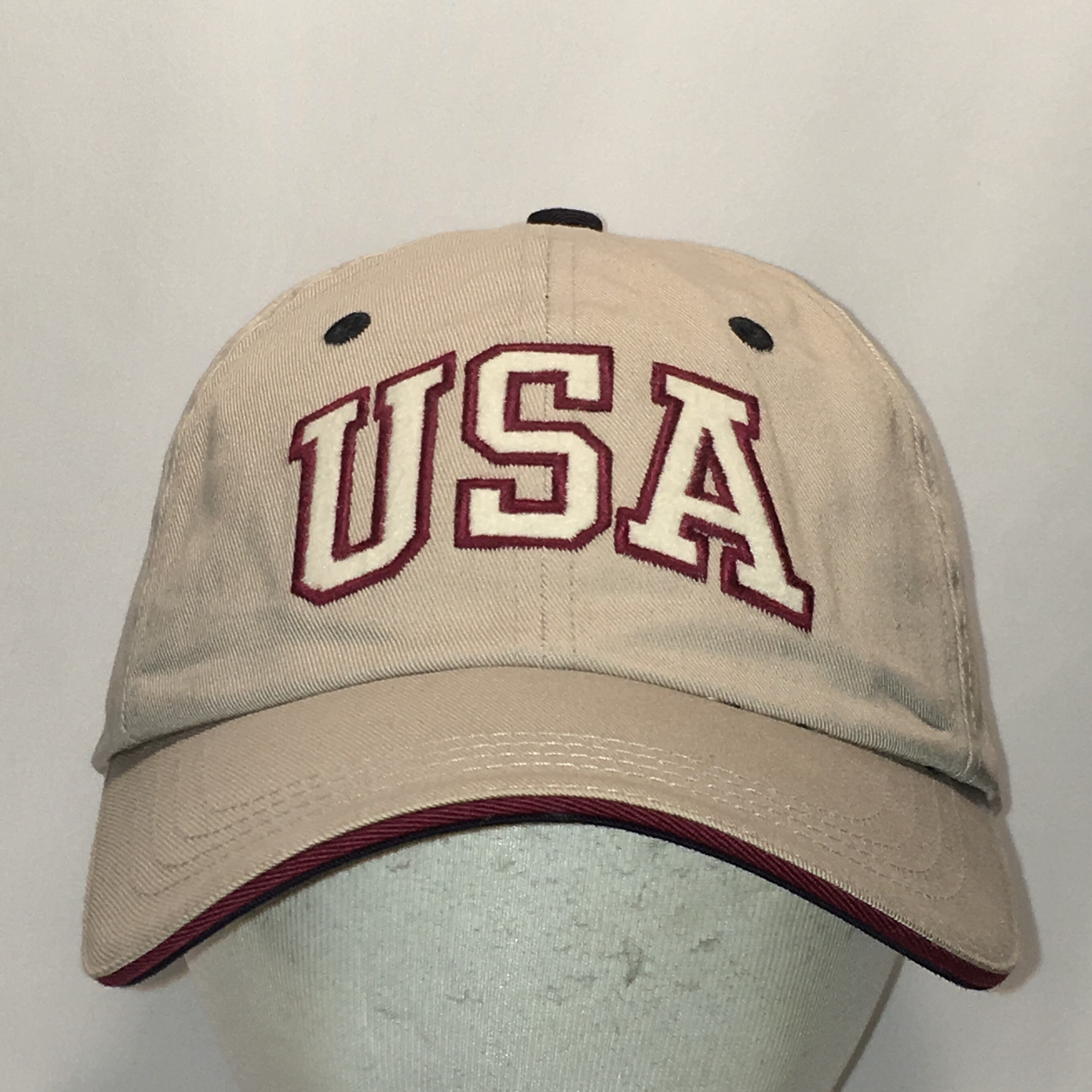 beige strapback hat