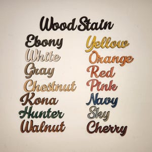 May include: Wood stain color samples in various shades, including ebony, white, gray, chestnut, kona, hunter, walnut, yellow, orange, red, pink, navy, sky, and cherry.