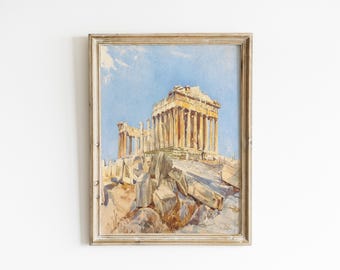 Puede incluir: Una pintura en acuarela enmarcada que representa las ruinas del Partenón en Atenas, Grecia. La obra muestra columnas de piedra en tonos dorados contra un cielo azul claro, con fragmentos de roca dispersos en primer plano, todo en un marco de madera clara.
