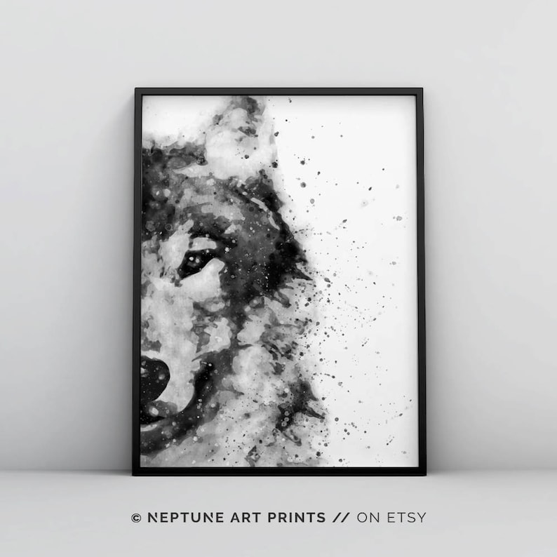 May include: Black and white watercolour painting of a wolf's face. The wolf's eye is visible and the background is a white splatter pattern.