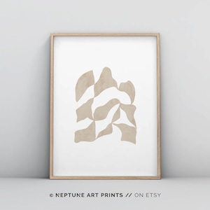 May include: Abstract art print featuring a beige geometric design on a white background. The print is framed in a light wood frame. &copy; NEPTUNE ART PRINTS // ON ETSY