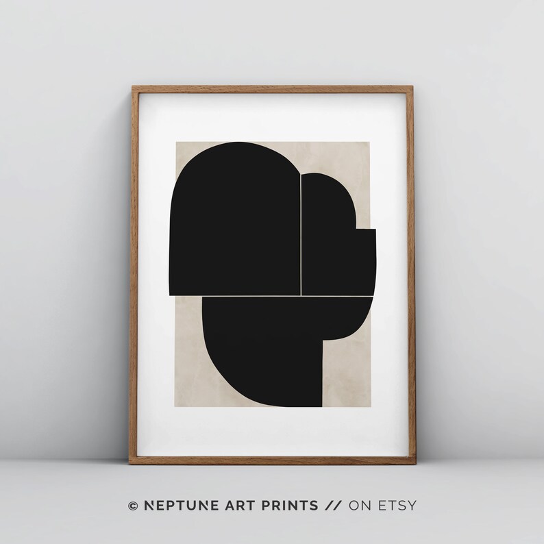May include: A black and white abstract geometric print with a beige background. The print features overlapping shapes in a modern style.