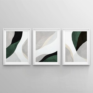 Puede incluir: Tres impresiones de arte abstracto enmarcadas con un fondo blanco y formas abstractas verdes y negras.