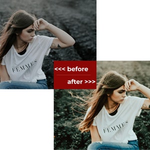 May include: A woman wearing a white t-shirt with the word "FEMMES" printed on it, blue jeans, and a triangle tattoo on her arm. She is sitting on a rocky surface with her hand on her forehead, looking down.