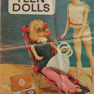 May include: A magazine cover featuring a doll sitting in a red and white striped beach chair. The cover reads "50 Things to Make for Teen Dolls".