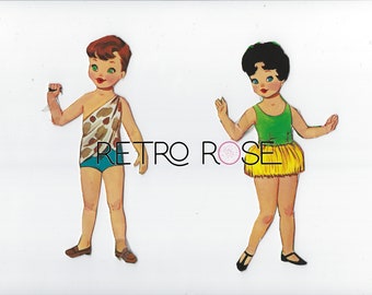 Vintage sixties paper doll kids with costumes for dress ups