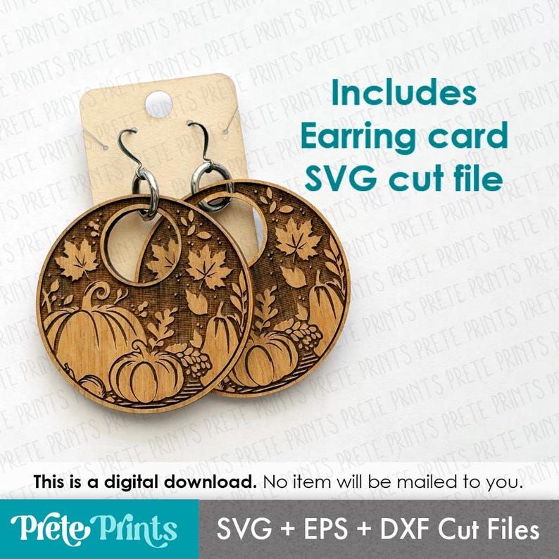 May include: Wooden laser-cut earrings with a fall theme. The earrings feature pumpkins, leaves, and grapes. The text "Includes Earring card SVG cut file" is visible. The earrings are attached to a cardboard earring card.