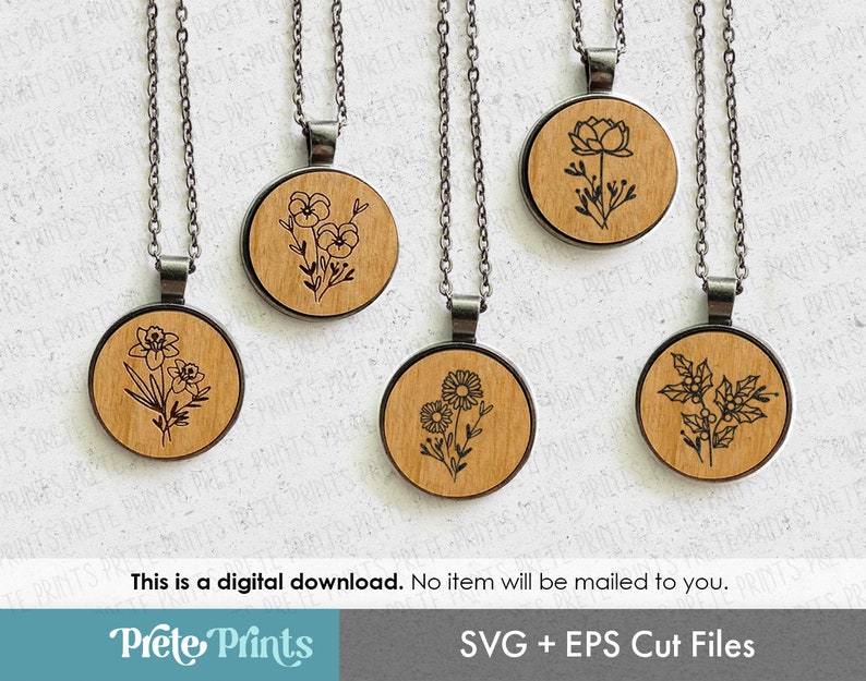 Puede incluir: Cinco collares con colgante de madera, cada uno con un dise&ntilde;o floral diferente. Cada colgante es un disco redondo de madera con una cadena negra.