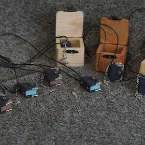 One inch tiny handmade leather notebook pendant in wooden box