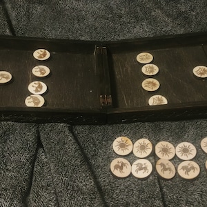 Fantasy themed slingpuck/slingshot wooden foldable board game, Quarantine/Lockdown training