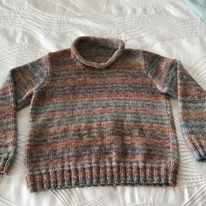 Unisex kid's jumper / sweater with rolled neck. Variegated colours. image 1