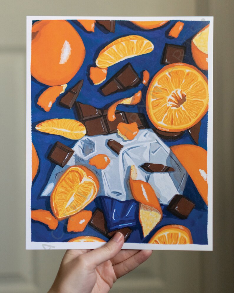 May include: A painting depicting orange segments and pieces of chocolate on a blue background. The orange segments are arranged in a random pattern, and the chocolate pieces are scattered around them. The painting is executed in a realistic style.
