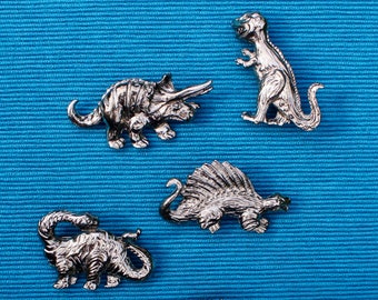 Broche vintage de dinossauro do Parque Jurássico, pins vintage de T-Rex, Brontossauro e Estegossauro.