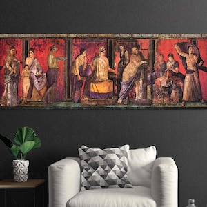 May include: A vintage painting depicting a scene from ancient Roman life. The painting features a group of people in colorful robes and tunics, standing and sitting in a room with red walls and a decorative border. The painting is framed and appears to be on a wall.