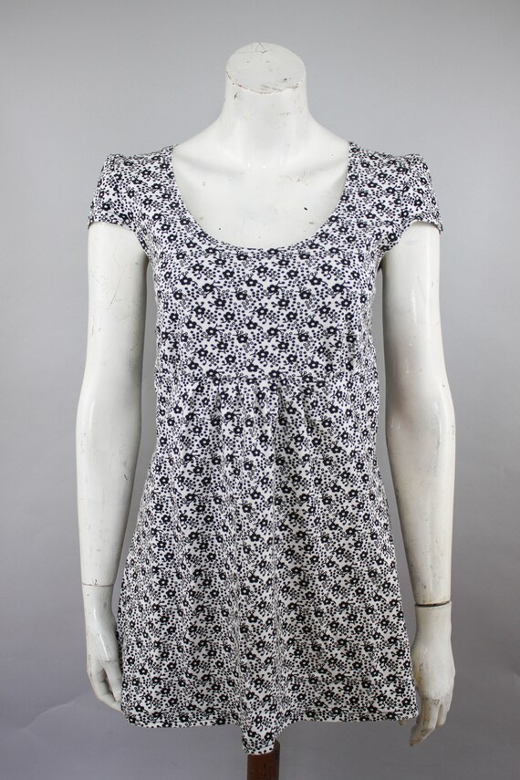 white dress with black flowers