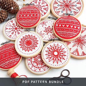 May include: A set of nine embroidery hoop patterns featuring red and white Christmas ornaments, snowflakes, and geometric designs. The patterns are printed on white fabric and are ready to be stitched. PDF PATTERN BUNDLE.