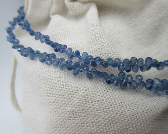 Blue sapphire in natural colour-undyed faceted grapefruit