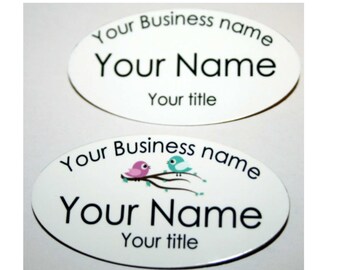 May include: Two white oval name tags with black text. The top tag says "Your Business name Your Name Your title". The bottom tag has a pink and blue bird graphic and says "Your Business name Your Name Your title".