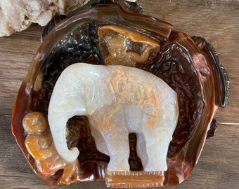 Carved Carnelian Elephant with Children and Leaves