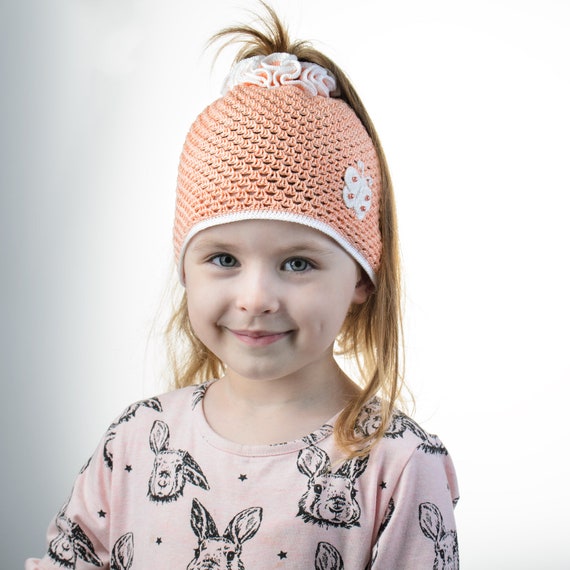 crochet hat with hair hole