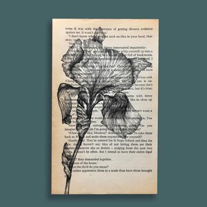 May include: A black and white ink drawing of an iris flower. The flower is drawn on top of a page of text from a book. The text is about divorce and family.