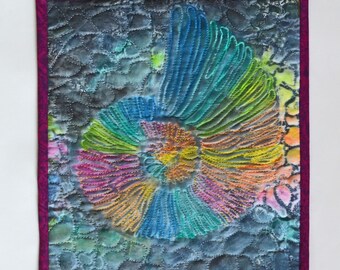Ammonite quilt in Rainbow Colors