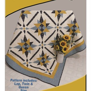 May include: A quilt pattern called "Propensity" designed by Deb Heatherly. The quilt features a star design in shades of blue, yellow, and black on a white background. The pattern includes instructions for lap, twin, and queen sizes.