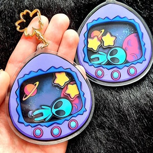 Außerirdisches Haustier, niedlicher Shaker-Charm, Virtueller Haustier-Shaker-Schlüsselanhänger, süße Alien-Geschenke, süße Haustiergeschenke, 90er Jahre Nostalgie, 90er Spiele, Aliencharme