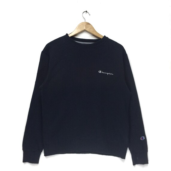champion jumper small logo