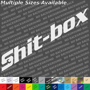 May include: White vinyl decal with the text "Shit-box" in a bold, slanted font. The decal is on a gray background with the words "No Background" repeated in a pattern.