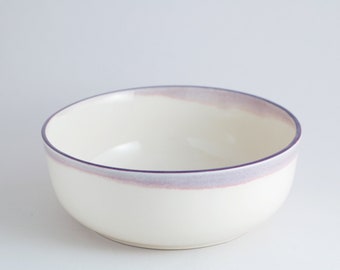 Ceramic bowl. Breakfast bowl. Off white and violet. Minimalist decor. Design object. Contemporary shape. Boho chic