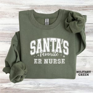 Sweat-shirt de Noël, pull d'infirmière des urgences, cadeau de Noël pour infirmière des urgences, col rond de Noël préféré du père Noël, cadeau d'appréciation de l'infirmière des urgences pour elle
