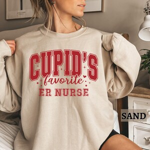 Valentine's Sweatshirt, ER Nurse Sweater, Valentine's Gift for ER Nurse,Cupids Favorite Nurse Valentines Crewneck,ER Nurse Appreciation Gift