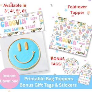 May include: Printable bag toppers, gift tags, and stickers with a school theme. The design includes a smiley face cookie, a fold-over topper, and bonus tags. Text includes "Groovin' into a New School Year!" Available in 3", 4", 5", and 6".