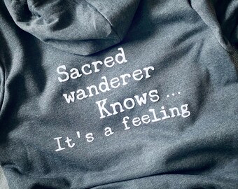 Sacred Wanderer knows...Its a feeling Unisex Hoodie