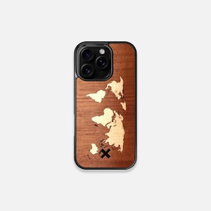 May include: A wooden phone case with a world map design in gold. The case is brown with a black camera cutout and a black X in the lower right corner.