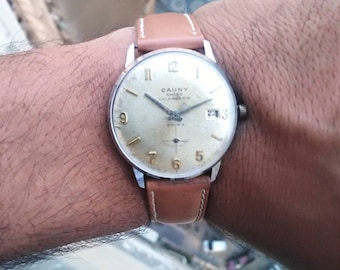 Cauny Calenjario, Cauny Prima, Men'sVintage watch, ManualWind up Movment