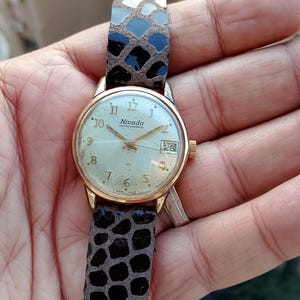 Vintage Nivada compensamatic