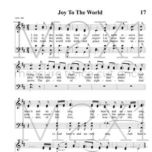 May include: Sheet music for "Joy To The World" in black and white. The musical score includes lyrics and musical notation. The title is at the top, with the page number 17 on the right. The sheet music is for a choir.
