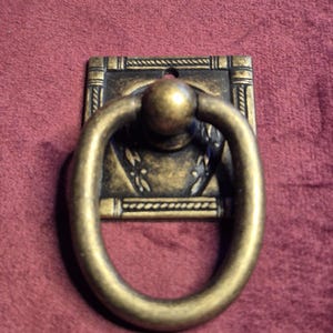 Maniglia in ottone antico