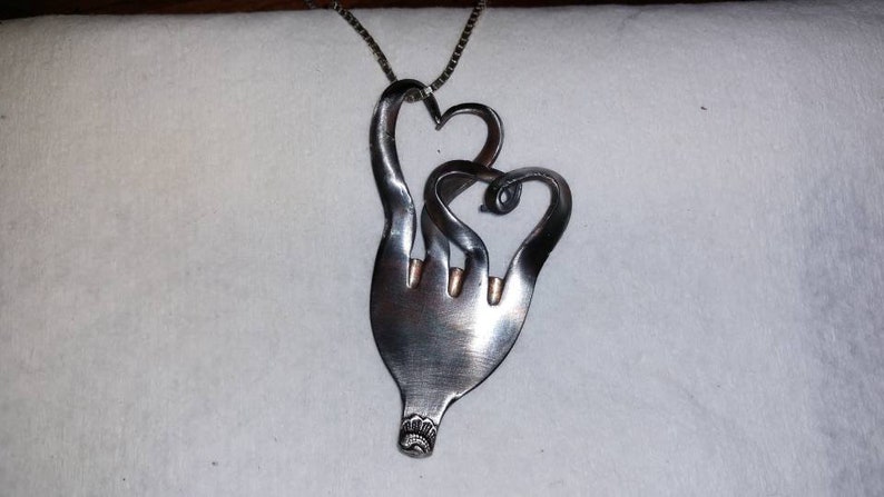 2 hearts upcycled silverware pendant Silverware jewelry Handmade. Recycled silverware