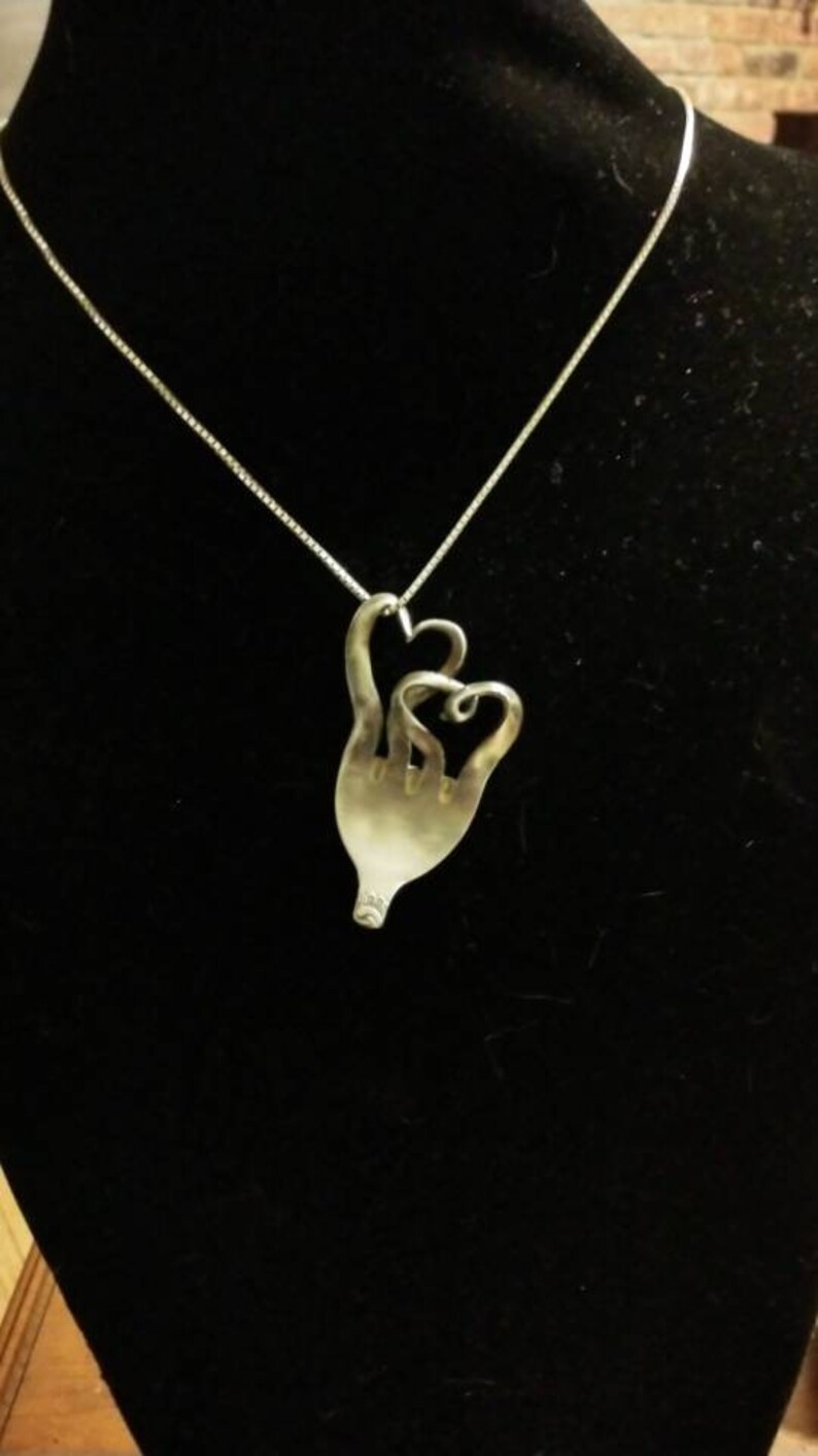 2 hearts upcycled silverware pendant Silverware jewelry Handmade. Recycled silverware