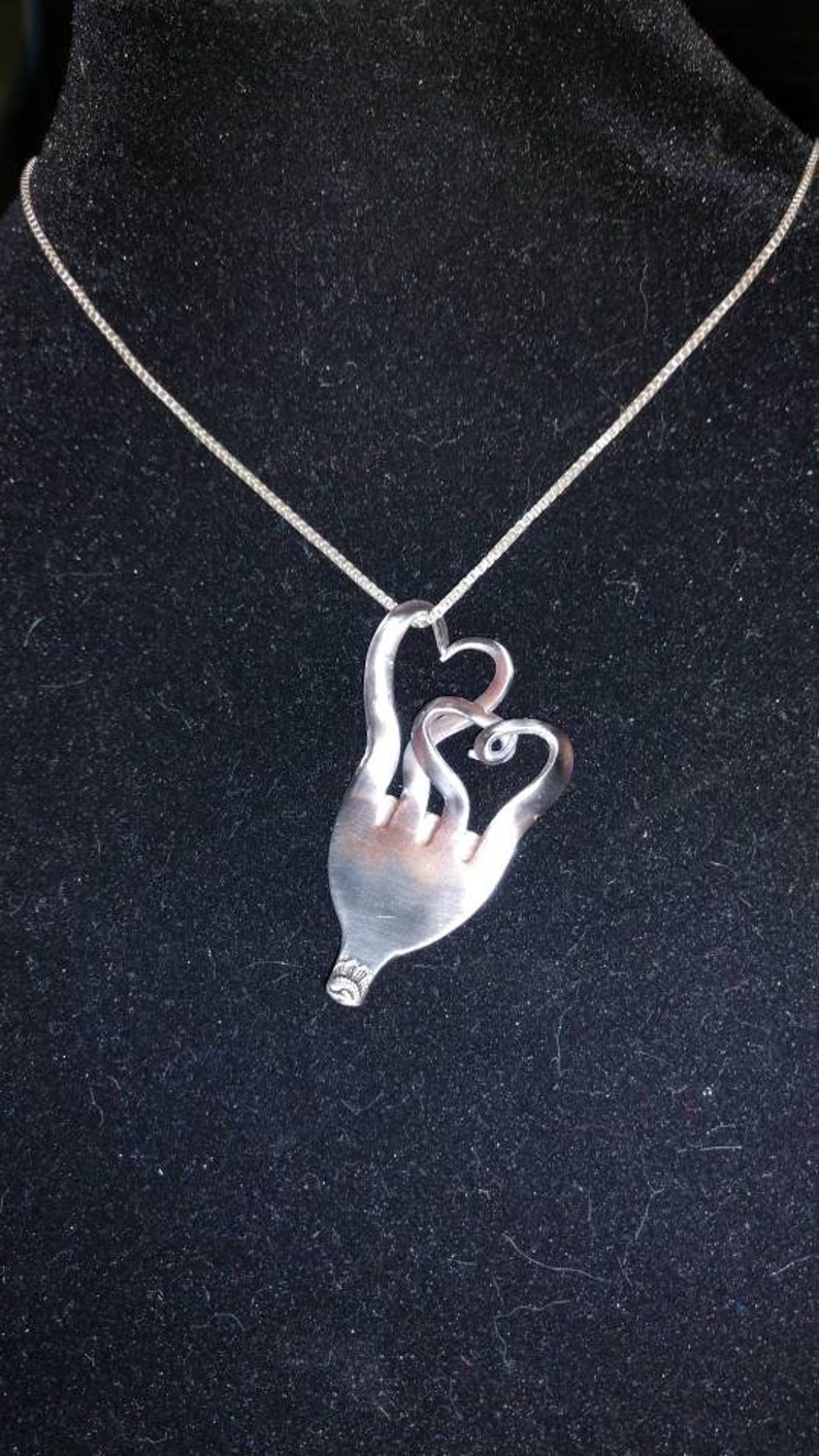 2 hearts upcycled silverware pendant Silverware jewelry Handmade. Recycled silverware