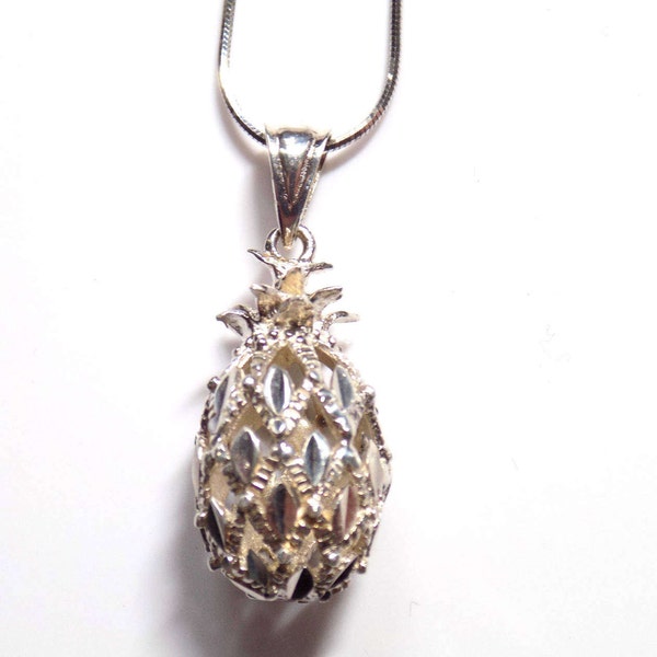 Diamond cut sterling silver pineapple pendant and 18" sterling silver chain