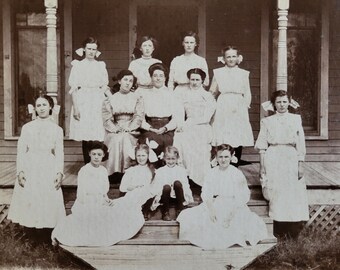 Antique Photograph of Children Posing on the Porch