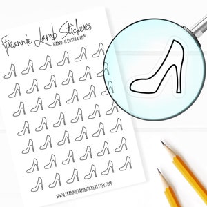 May include: A sheet of white paper with black outline stickers of high-heeled shoes. The text "Freannie Lamb Stickers" and "Hand Illustrated" is at the top of the sheet. The text "WWW.FRANNIELAMBSTICKERS.ETSY.COM" is at the bottom of the sheet.